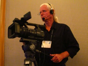 Andrew Cameron Bailey filming the 2013 Institute of Noetic Sciences Conference in Palm Desert, CA. July 2013. Photo: Connie Baxter Marlow